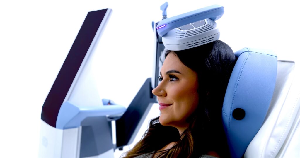Image of woman at Lumina Vein & Aesthetic using Exomind near Orlando to improve her mental wellness.