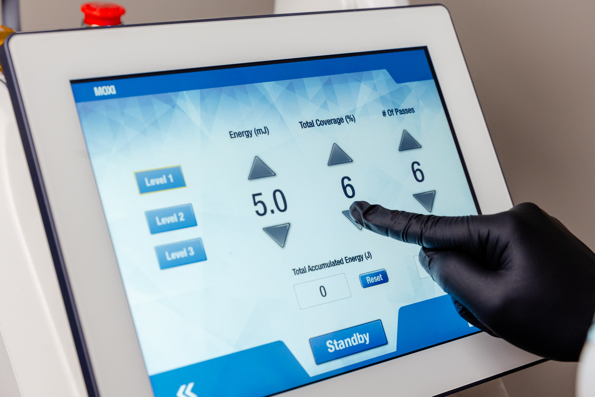 Moxi laser device screen at Lumina Vein and Aesthetic Institute